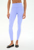 A model wearing light periwinkle blue high-waisted leggings with white side stripes, paired with black flat shoes, shown from the waist down against a white studio background.