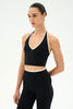 woman modeling a halter athletic top 