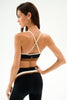 woman modeling a razorback bra
