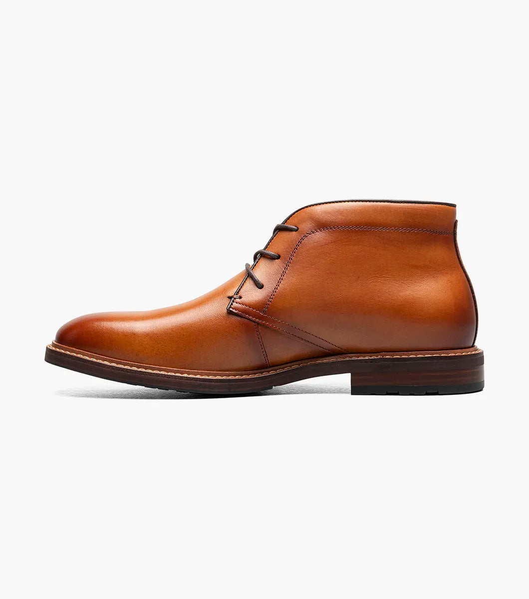 Brown leather shoe on a white background