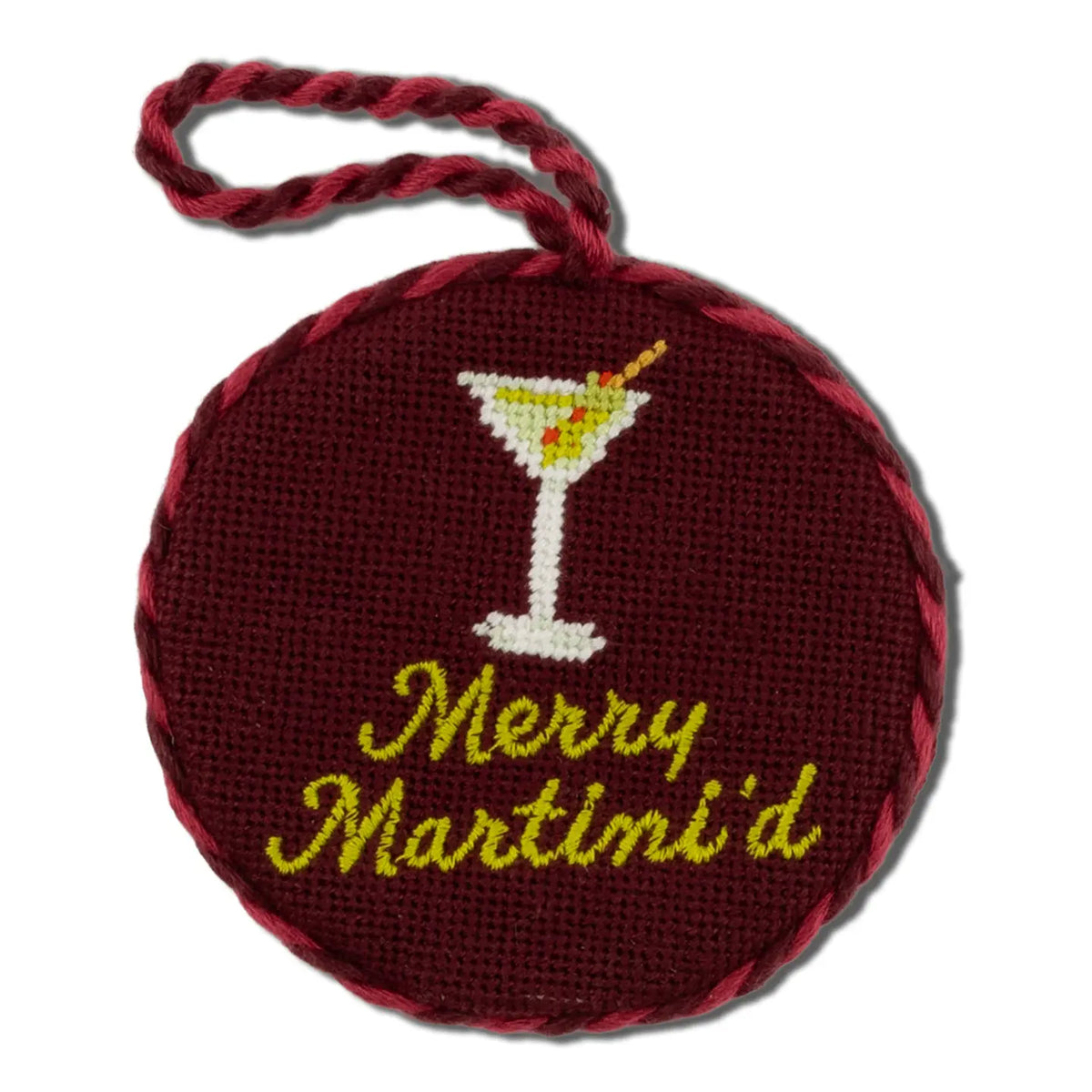 Round needlepoint ornament with a martini glass and 'Merry Martini'd' text on a white background
