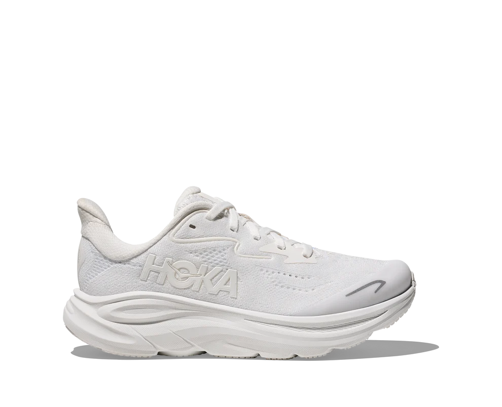 A white HOKA running shoe shown in a side profile view against a clean white background with a soft shadow underneath.
