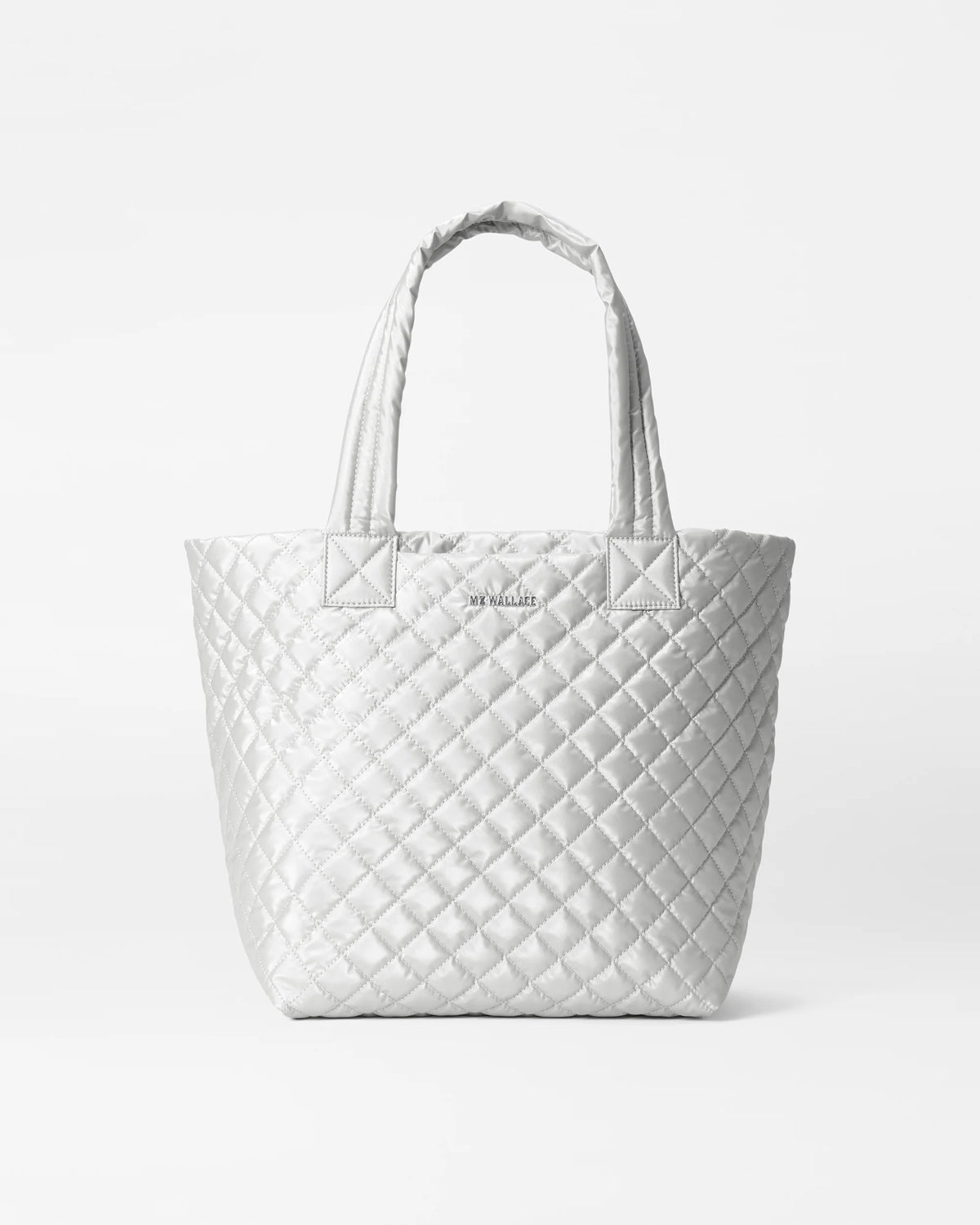 White quilted tote bag on a light gray background