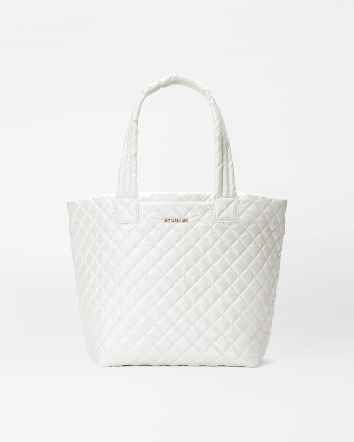 A white quilted tote bag with diamond stitching, featuring dual top handles and a small gold 'MICHAEL JACKSON' logo on the front, set against a seamless white background.