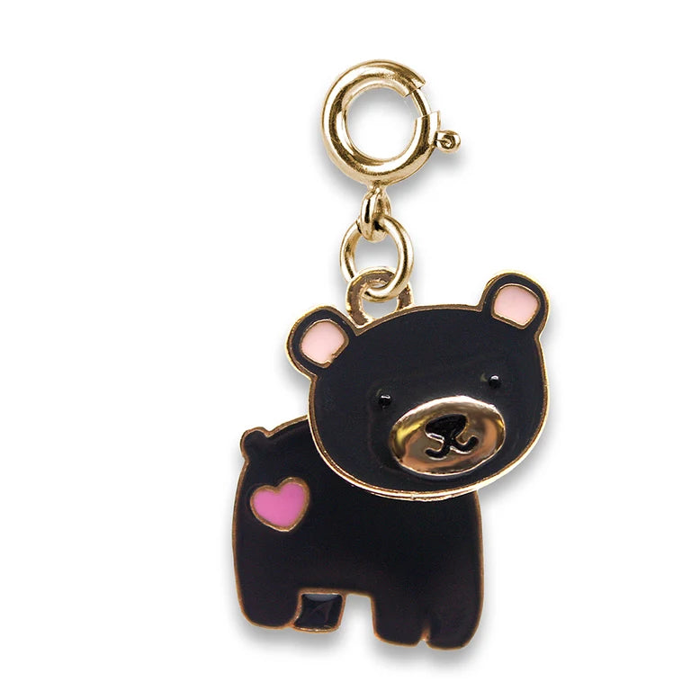 Black bear charm with pink heart and gold accents on a white background