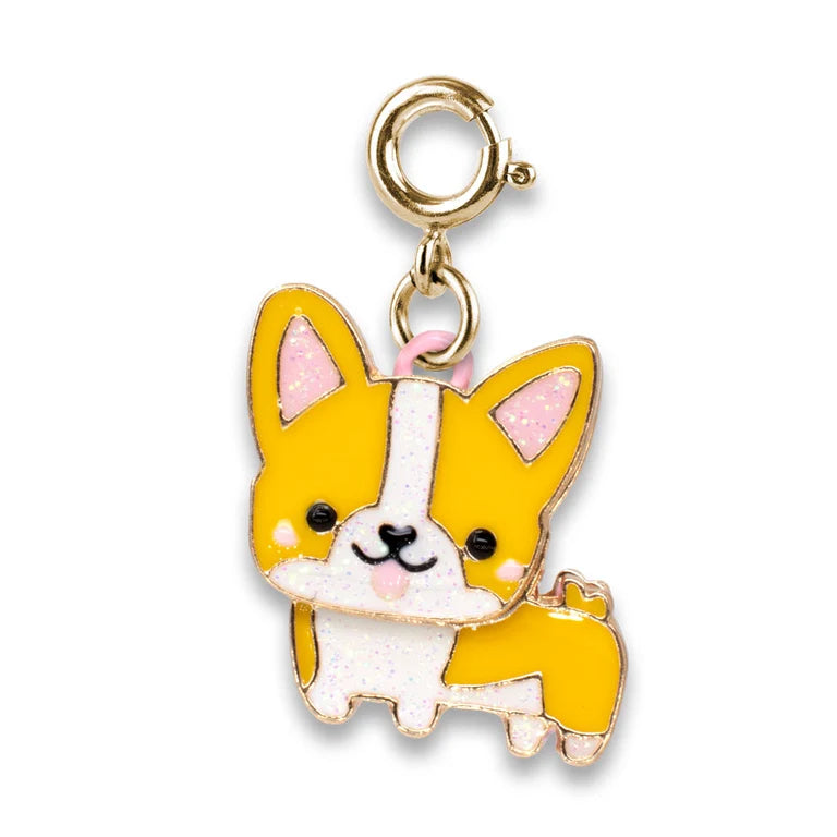 Dog-shaped charm with yellow and white body on a gold chain against a white background