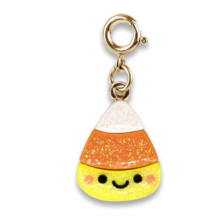 Candy corn-shaped charm with a gold clasp on a white background