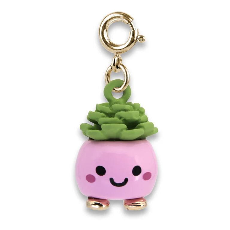 A cute pink succulent charm with a smiling face, green leaves, and gold-tone metal hardware on a plain white background.