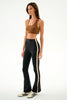 woman modeling yoga pants on a white background