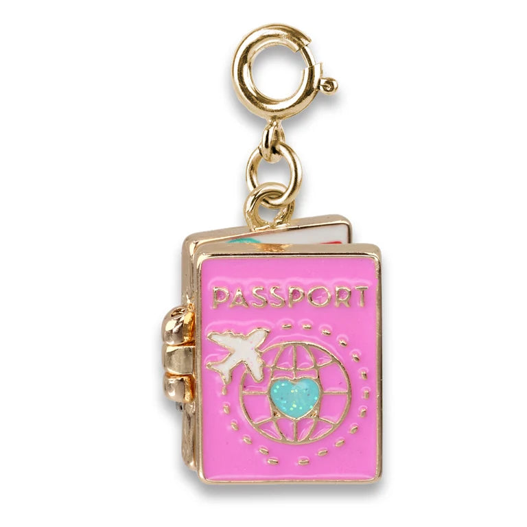 Pink passport charm with gold accents on a white background