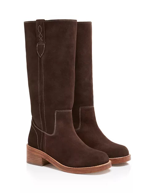 Two brown tall boots on a white background
