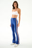 woman modeling yoga pants on a white background