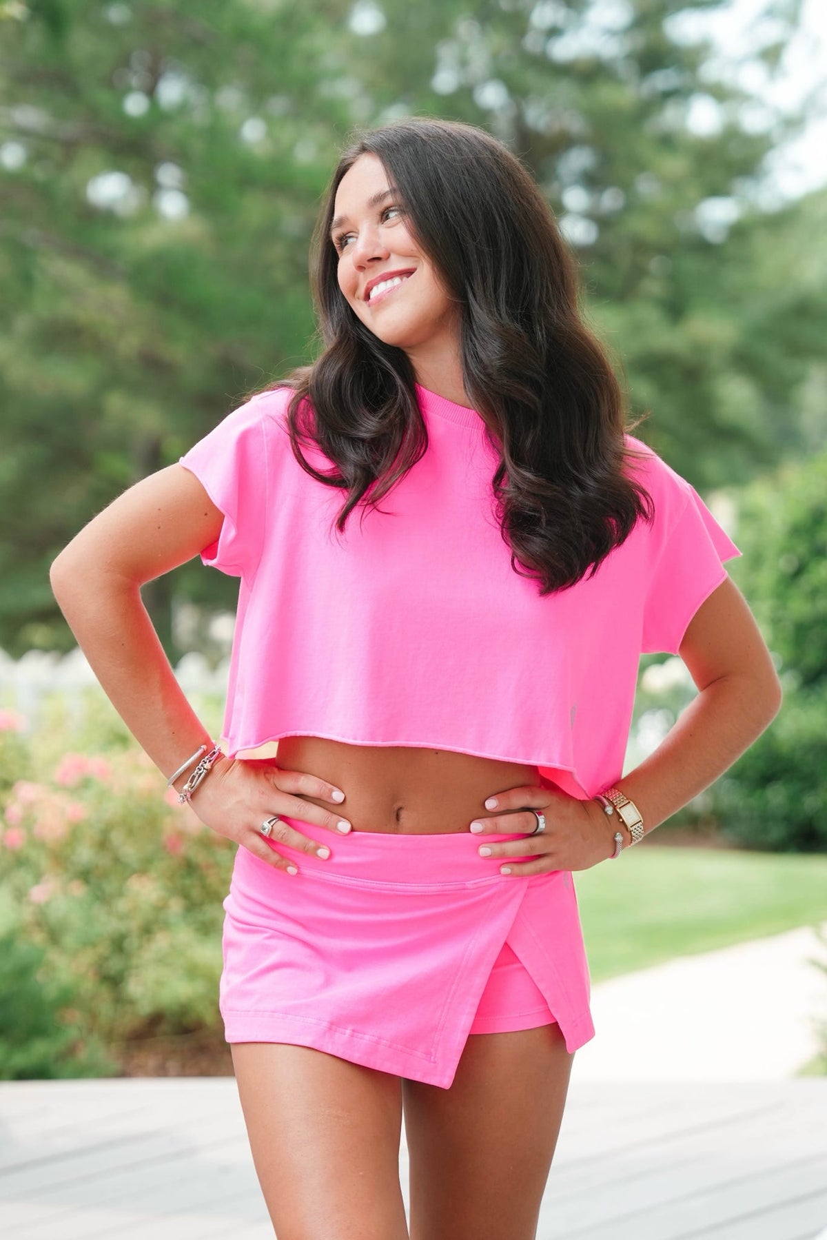 woman wearing an all pink outfit