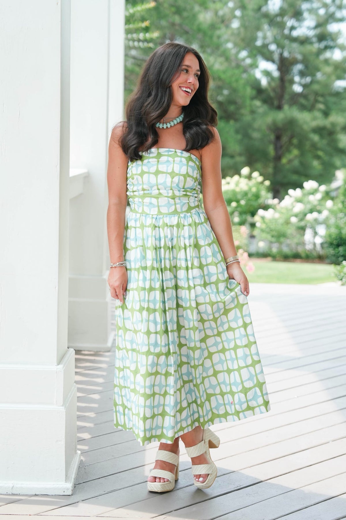 blue and green strapless dress with geometric pattern