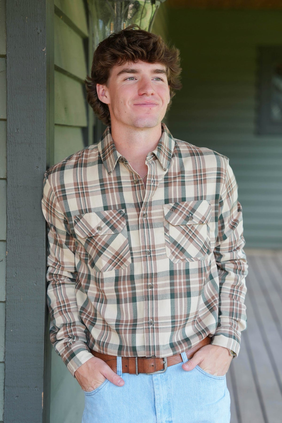 man modeling button down flannel