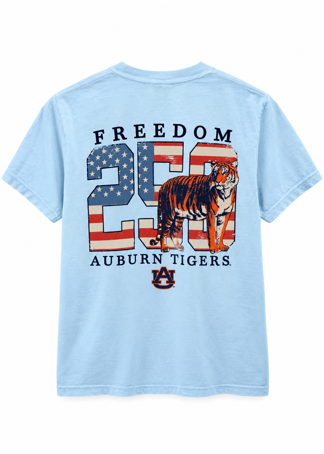 A light blue short-sleeve t-shirt showing the back graphic, which features the text 'FREEDOM 250 AUBURN TIGERS' and an illustration of an Auburn Tigers tiger over an American flag patterned '250'.