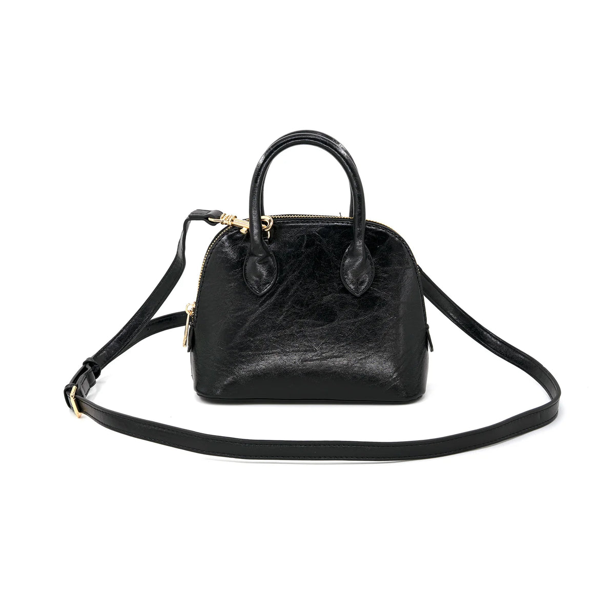 A black textured leather dome handbag with gold-tone hardware, featuring dual top handles and a detachable shoulder strap, photographed on a solid white background.