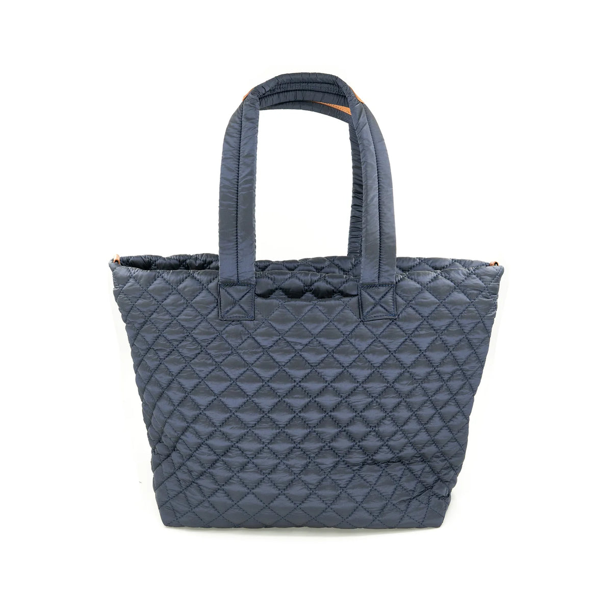 A navy blue quilted puffer tote bag with double top handles, shown against a plain white background.