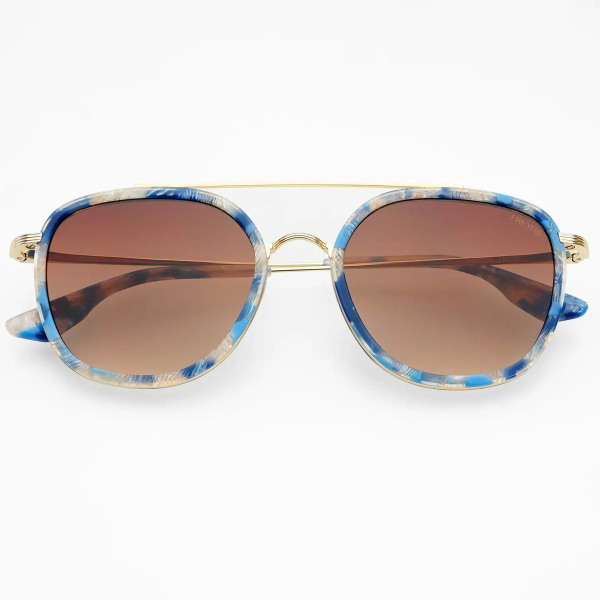 A pair of aviator-style sunglasses with a blue and white marbled acetate frame, gold metal rims, and brown gradient lenses, shown against a plain white background.