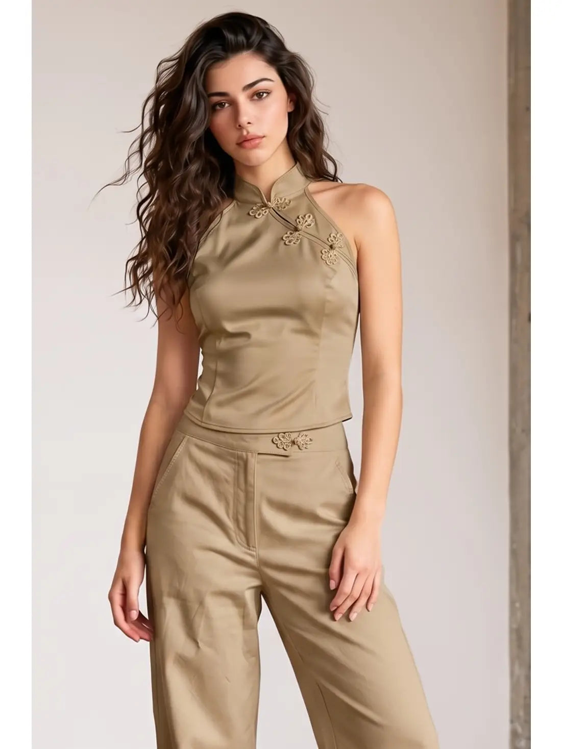 Girl wearing brown halter top and pants
