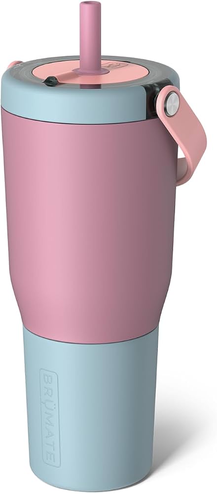 Pink and light blue tumbler with a straw on a white background