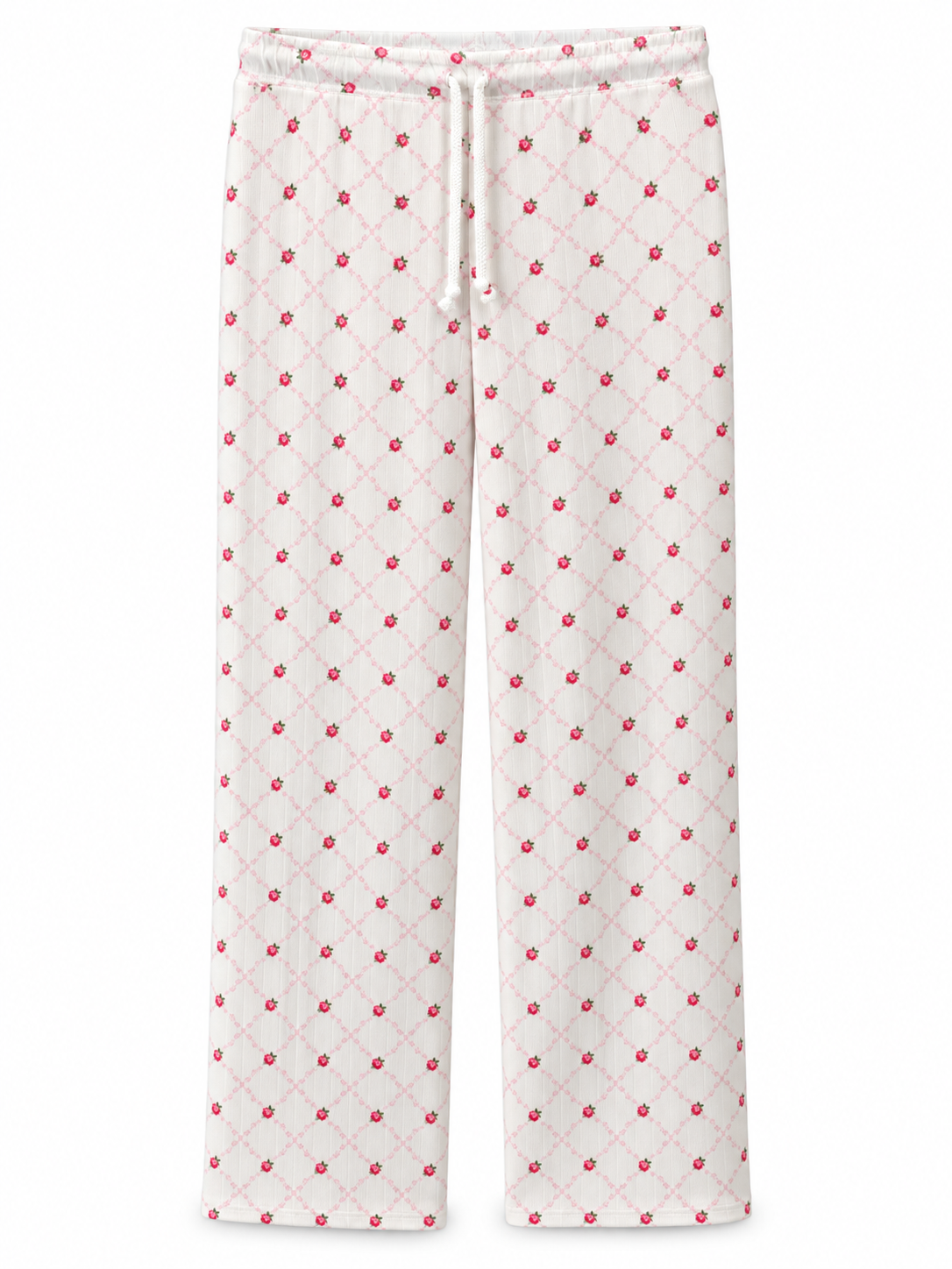 White ribbed straight-leg lounge pants with pink rosebuds, a pale pink diamond lattice pattern, and a white drawstring waist on a white background.