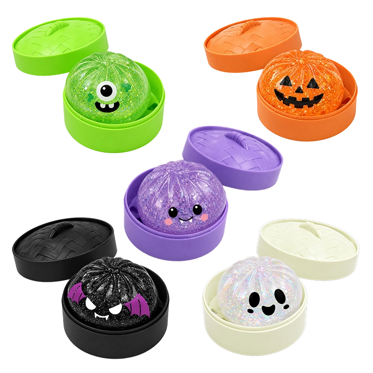 A set of Halloween-themed glitter ball toys in various colors, each shown with its matching round container lid. The colors include green, orange, purple, black, and white, with some balls decorated with cute cartoon faces.