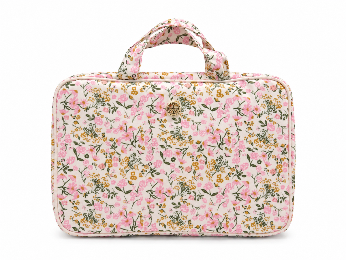 Toiletry bag with top handles and floral print