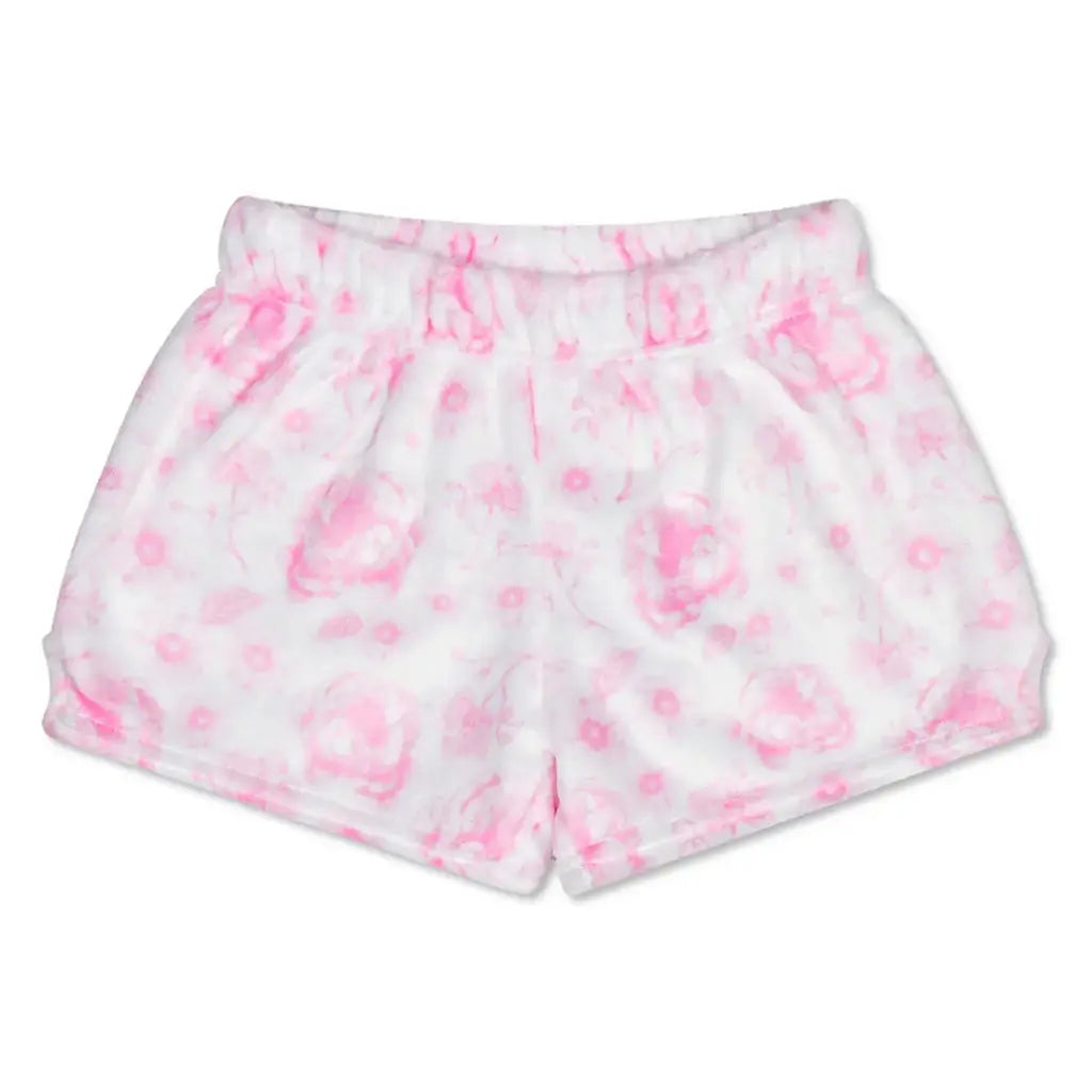 White plush lounge shorts with a pink watercolor floral pattern, featuring an elastic waistband.