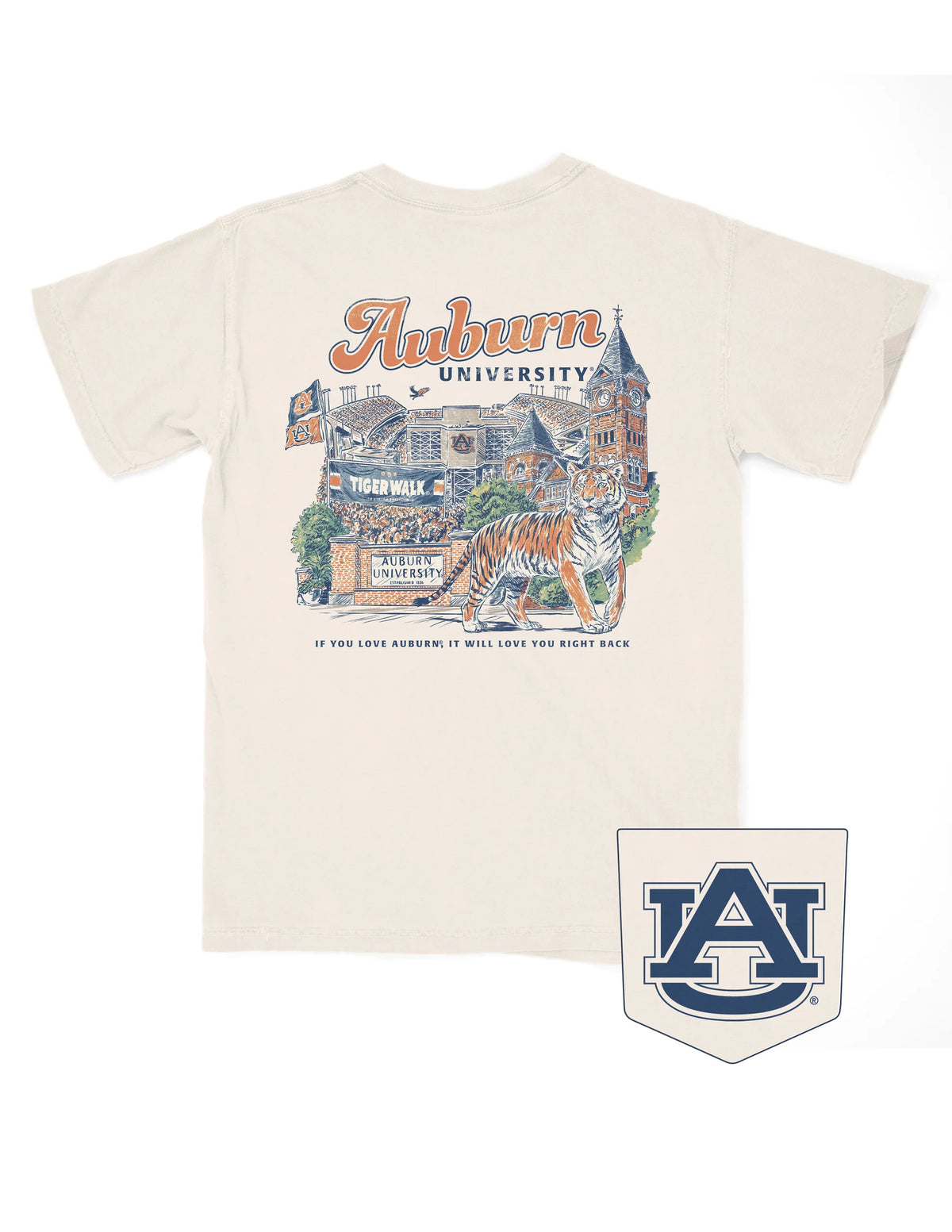 An off-white short-sleeve t-shirt featuring a large graphic print on the back with 'Auburn University' in orange script, a vintage building illustration, a tiger, and the Auburn 'AU' logo patch shown below the shirt.
