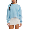 A woman wearing a light blue cropped crewneck sweatshirt and a white asymmetrical mini skirt, shown from the lips down against a plain white background.