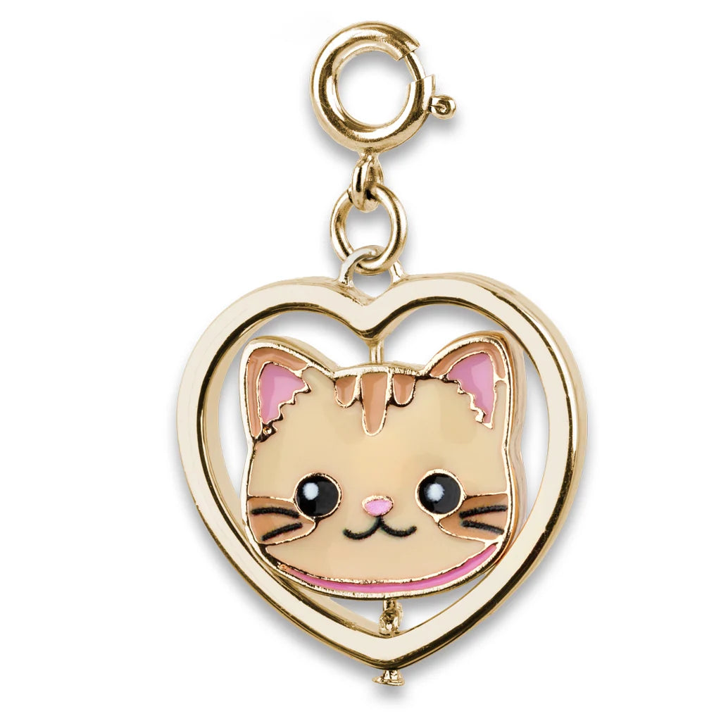Gold cat charm with a heart outline on a white background