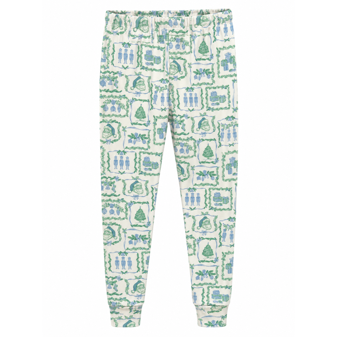 Christmas inspired and designed pajama pants with blue and green detailing on a white background. 