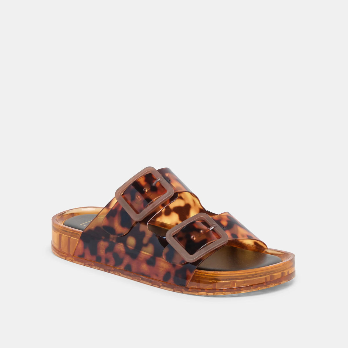 Tortoiseshell sandal with brown buckles on a light gray background