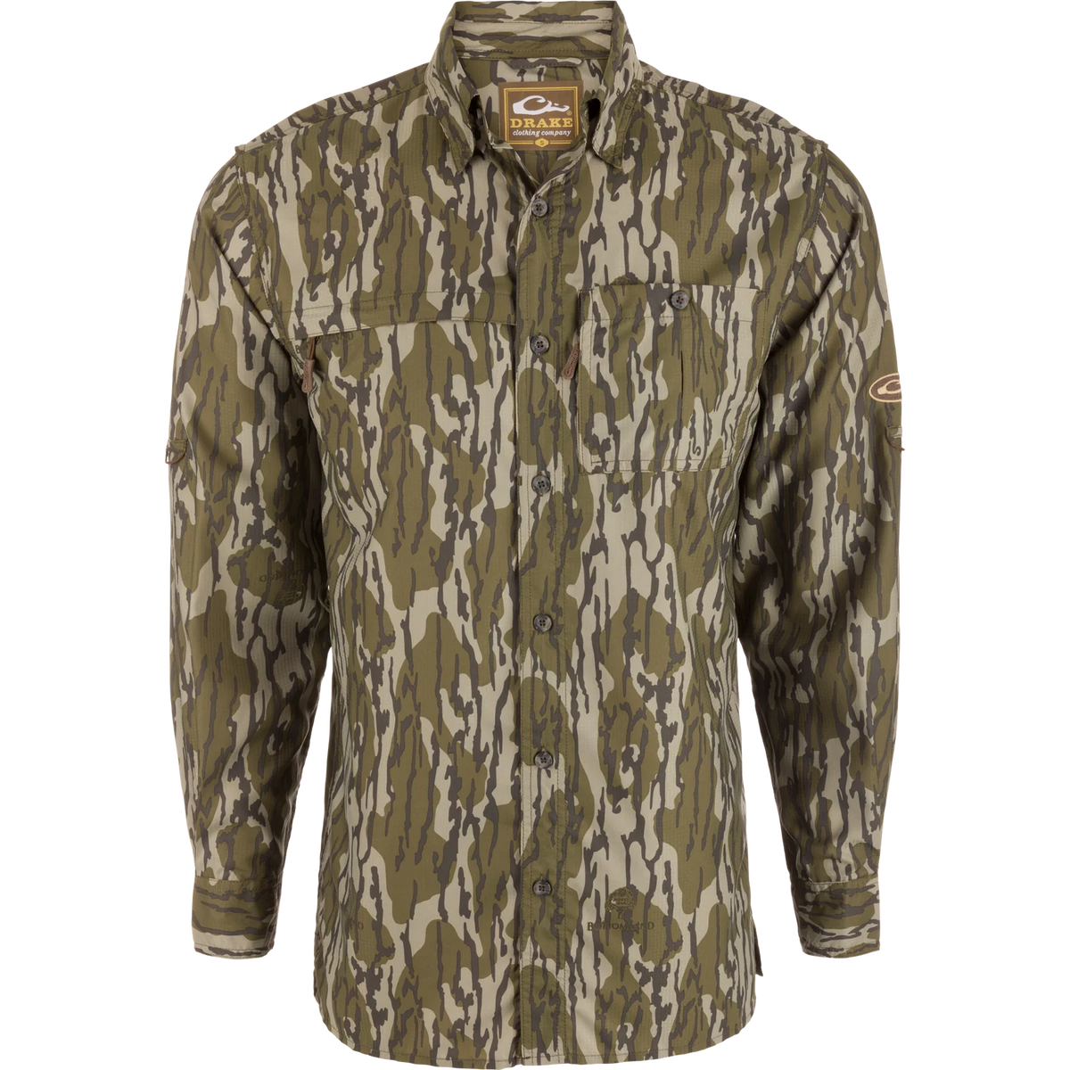 A long-sleeve button-up shirt in a brown and beige tree bark camouflage pattern, featuring a pointed collar, two chest pockets, and a visible Realtor logo patch on the left sleeve.
