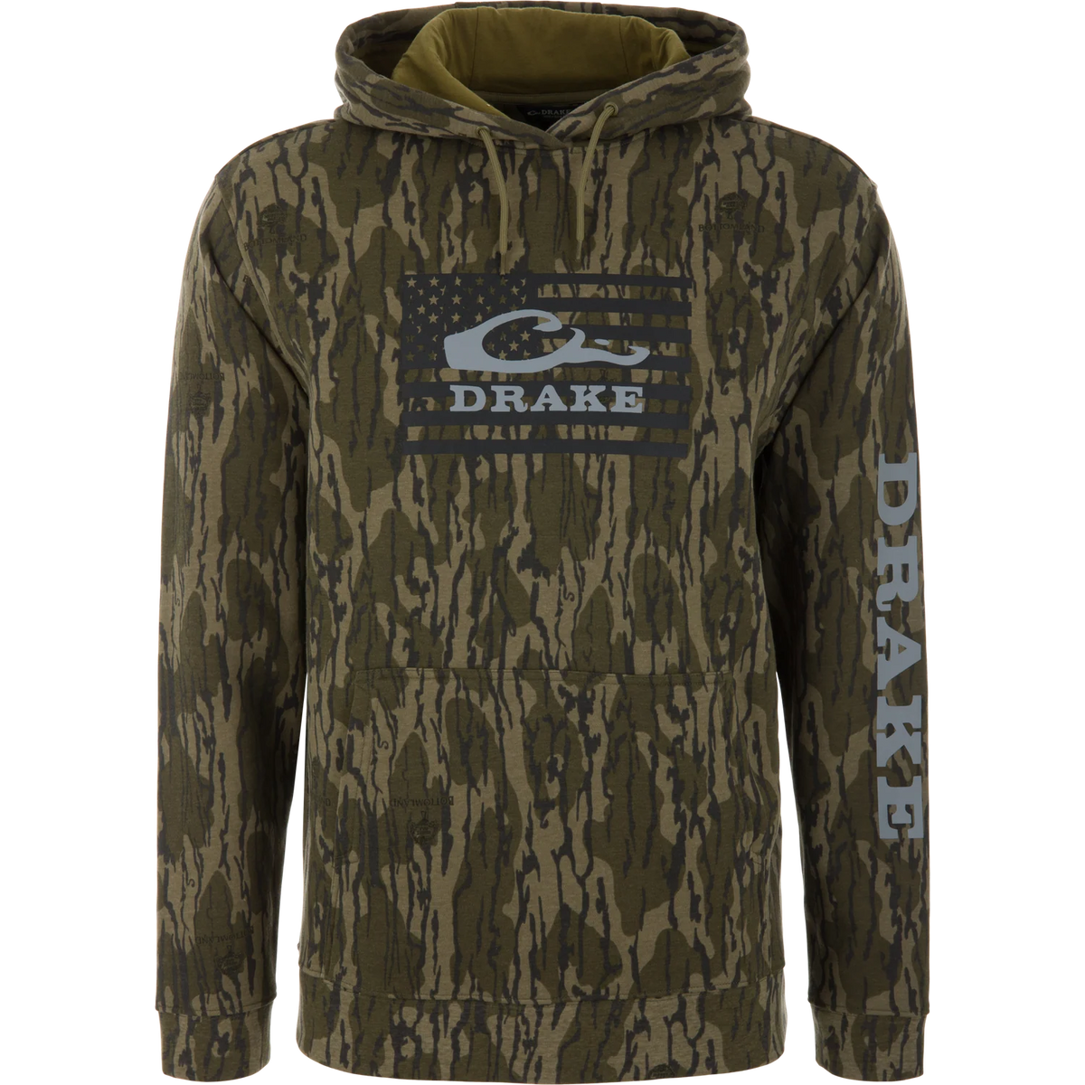 A long-sleeve hooded sweatshirt with an all-over camouflage pattern in olive green, brown, and black. It features a large distressed black and gray American flag graphic on the chest with the brand name 'DRAKE' in white.