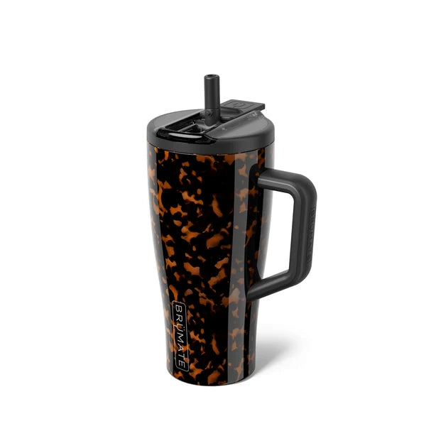 A Brumate travel tumbler with a black and orange tortoiseshell pattern, featuring a black handle, black lid, and a black straw, shown on a white background.