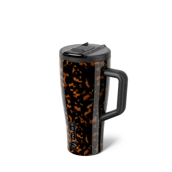 A Brumate travel tumbler with a black and orange tortoiseshell pattern, featuring a black lid and handle, shown on a white background.