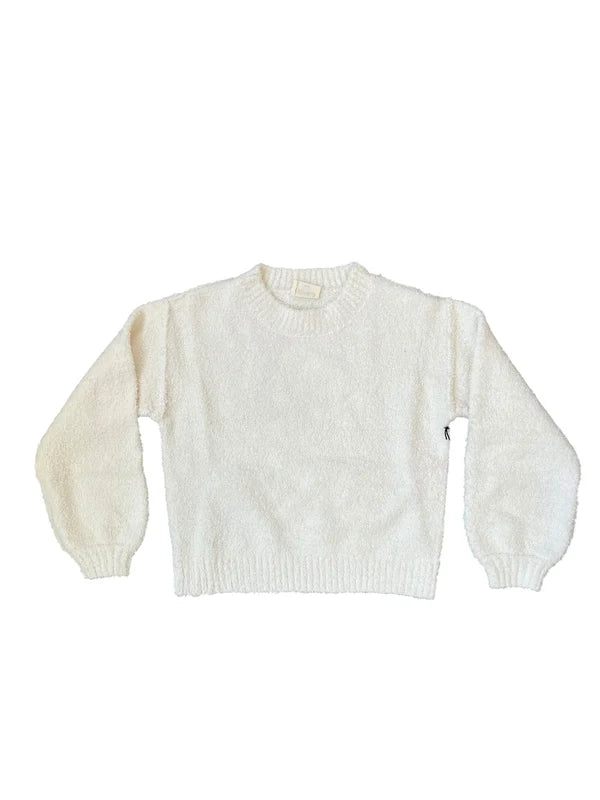 Cream sweater on white background