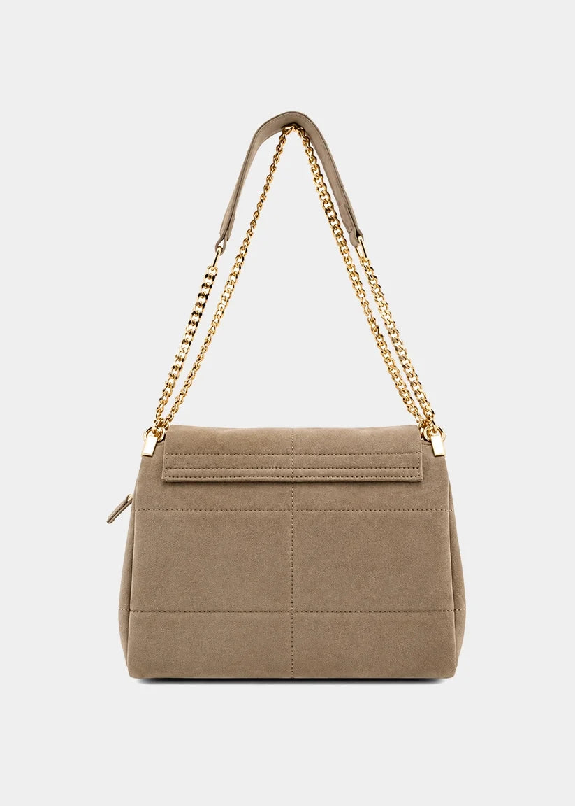 Back view of a taupe suede shoulder bag with gold chain strap and front flap pocket.
