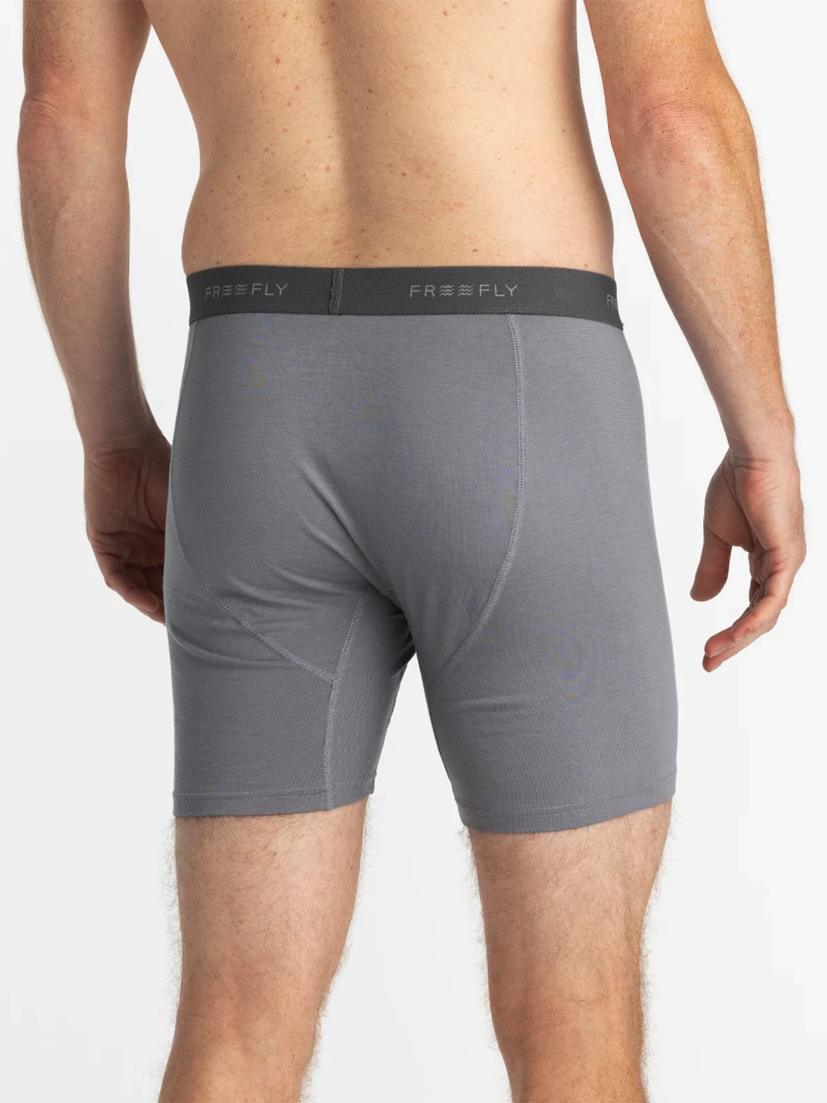 Gray boxer briefs with a black waistband on a white background