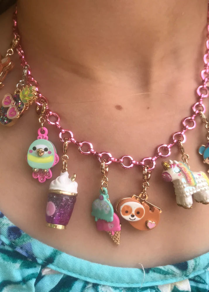 Necklace with various colorful charms worn by a person