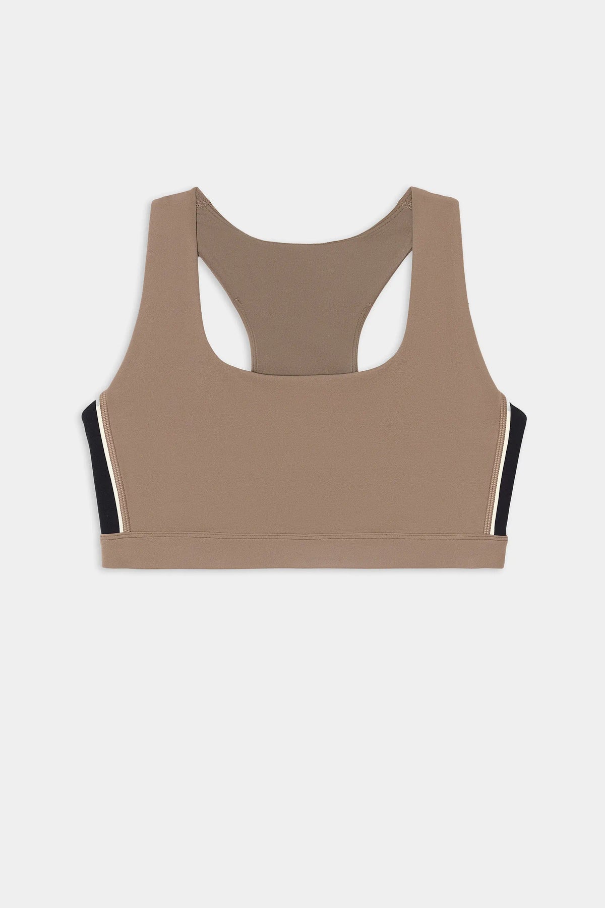 A beige athletic sports bra with a scoop neckline and racerback design, featuring black and white side stripe accents, shown against a light gray background.