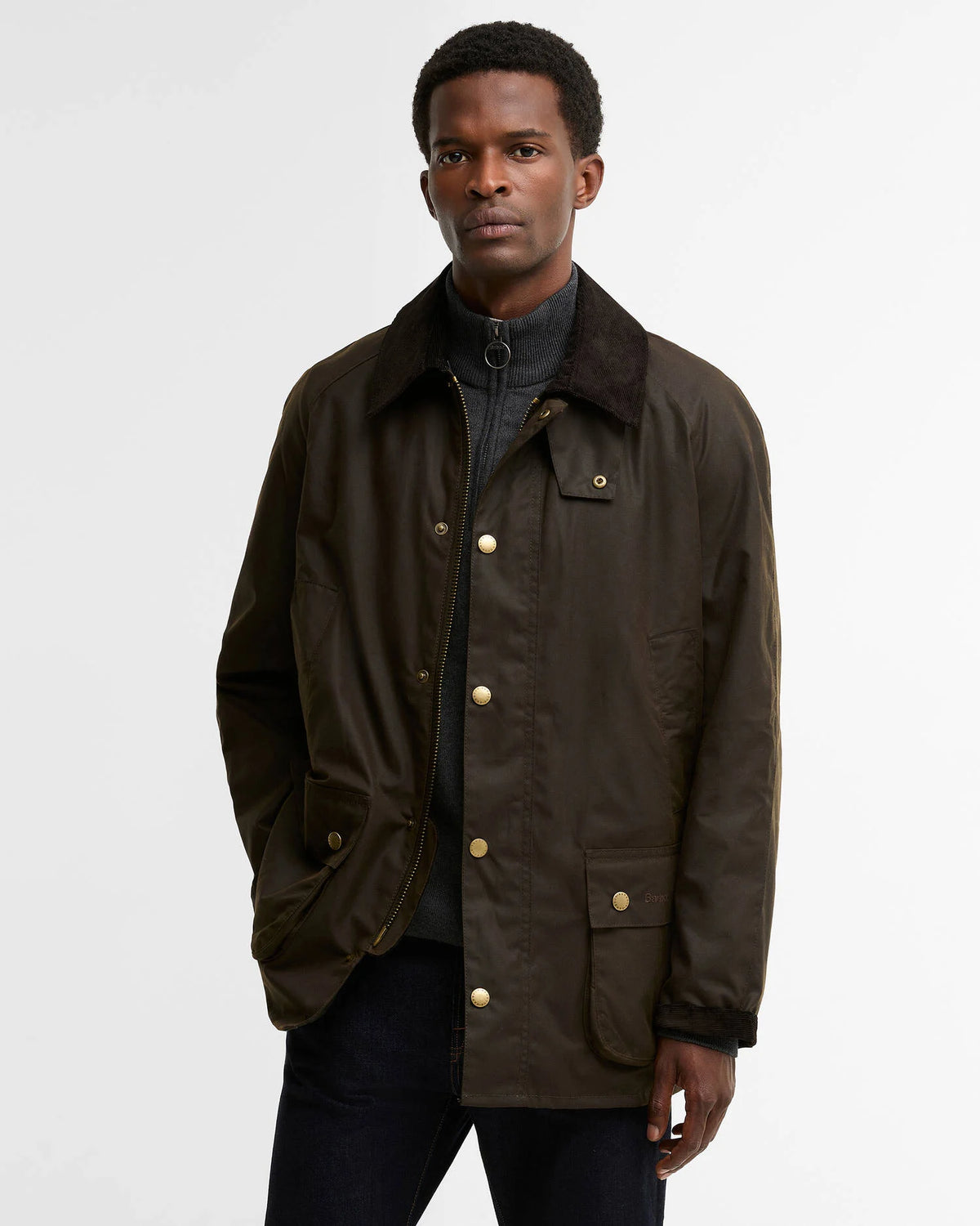 Man modeling olive green coat