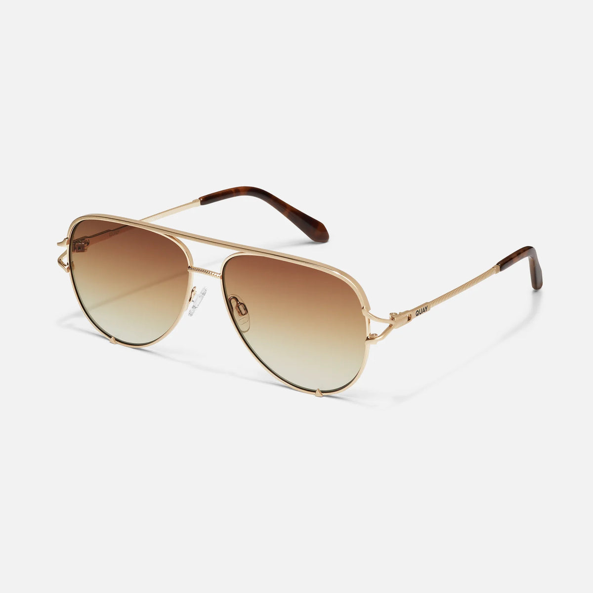 Gold-framed sunglasses with gradient lenses on a white background