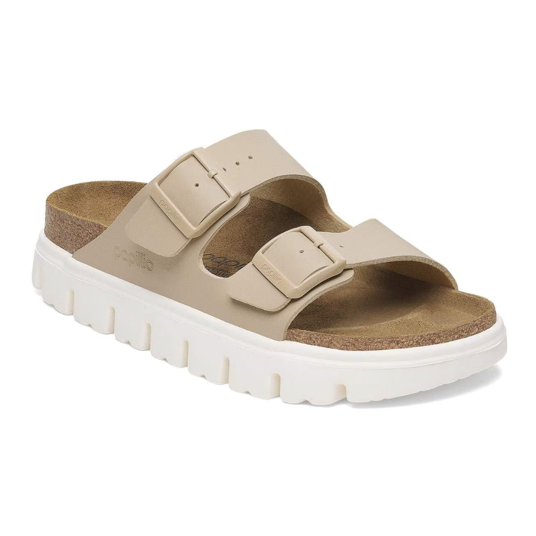 Beige sandal with white sole on a white background