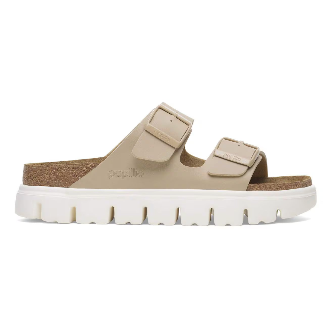 Beige sandal with white sole on a white background