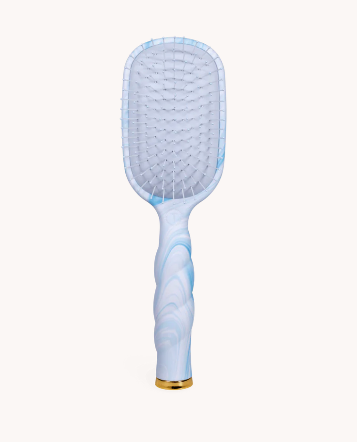 Blue paddle hairbrush with gold accents on a white background