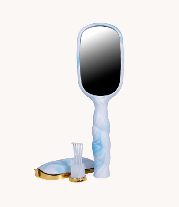 Handheld mirror with marble design on a white background