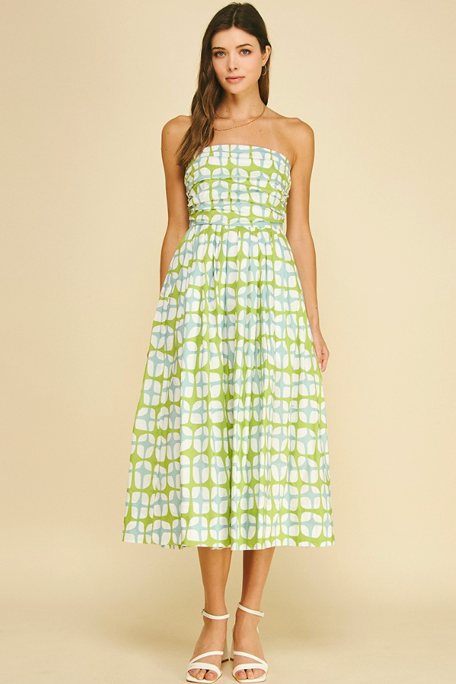 blue and green strapless dress with geometric pattern